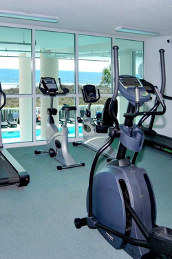 Fitness room with oceanfront view at Laguna Keyes